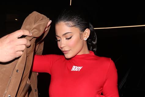 Kylie Jenner’s Leather Pants Match Her Buzzy Off 